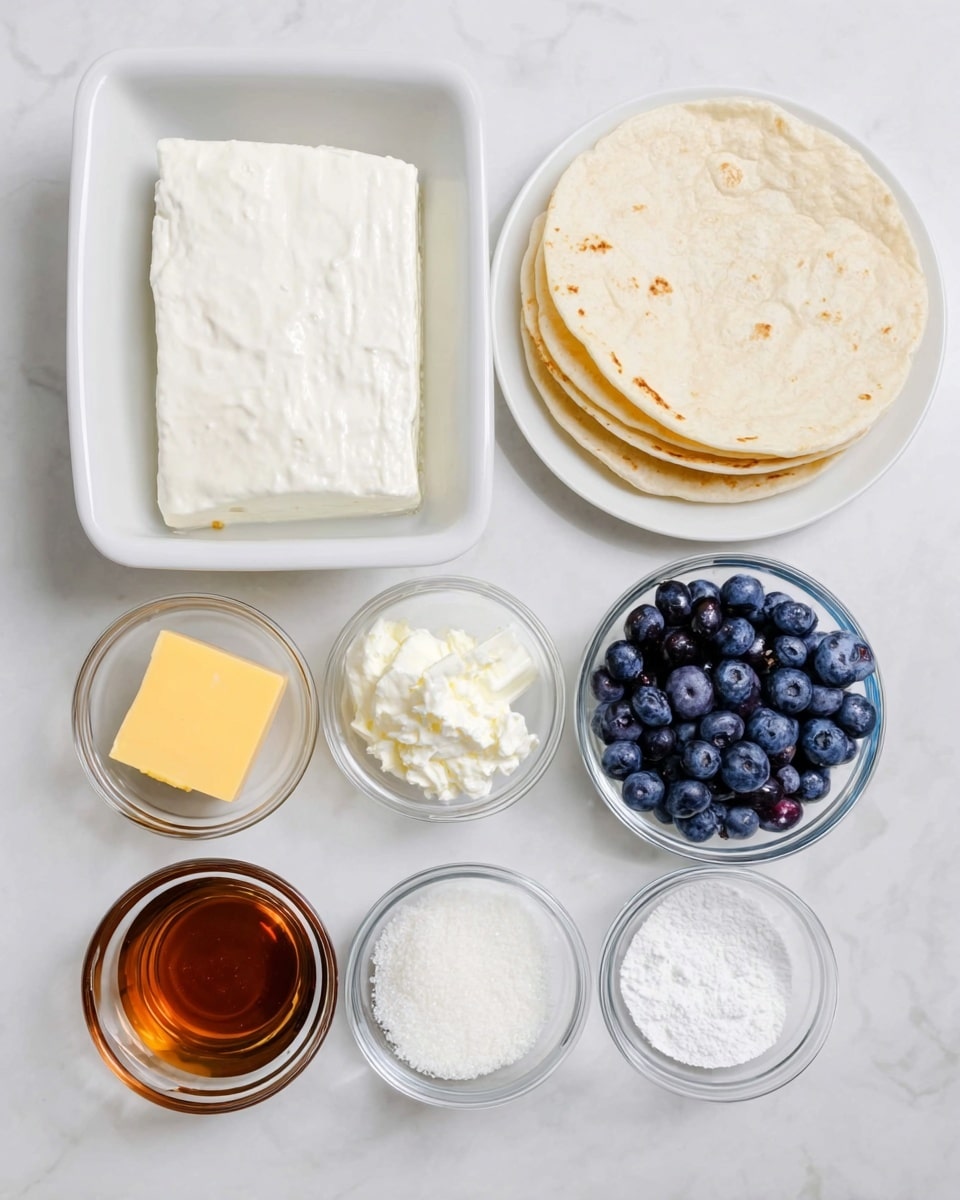 This image shows several ingredients on a white marbled surface. In the top left, there is a white rectangular dish holding a thick block of white cream cheese. To the right, on a white plate, there are four small round flour tortillas stacked together. Below, six small clear glass bowls hold different ingredients: a yellow cube of butter, white yogurt, dark amber-colored syrup, fresh dark blue blueberries, and white powdery sugar. The arrangement is neat with each bowl clearly visible and distinct. photo taken with an iphone --ar 4:5 --v 7
