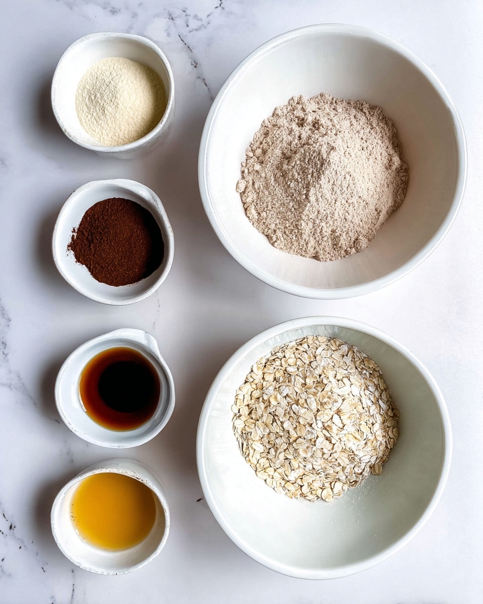 The image shows two white mixing bowls placed on a white marbled surface. The bowl on the top right contains a light brown powdery mixture, while the bowl on the bottom right holds a slightly lighter powdery mix. To the left of these bowls are five small white bowls arranged vertically, each holding different ingredients: pale beige yeast powder at the top, dark brown cocoa powder below that, thick dark syrup next, clear light oil after that, golden honey next, and rolled oats at the bottom. The ingredients are neatly arranged, creating a clean and organized look with soft natural lighting. Photo taken with an iphone --ar 4:5 --v 7