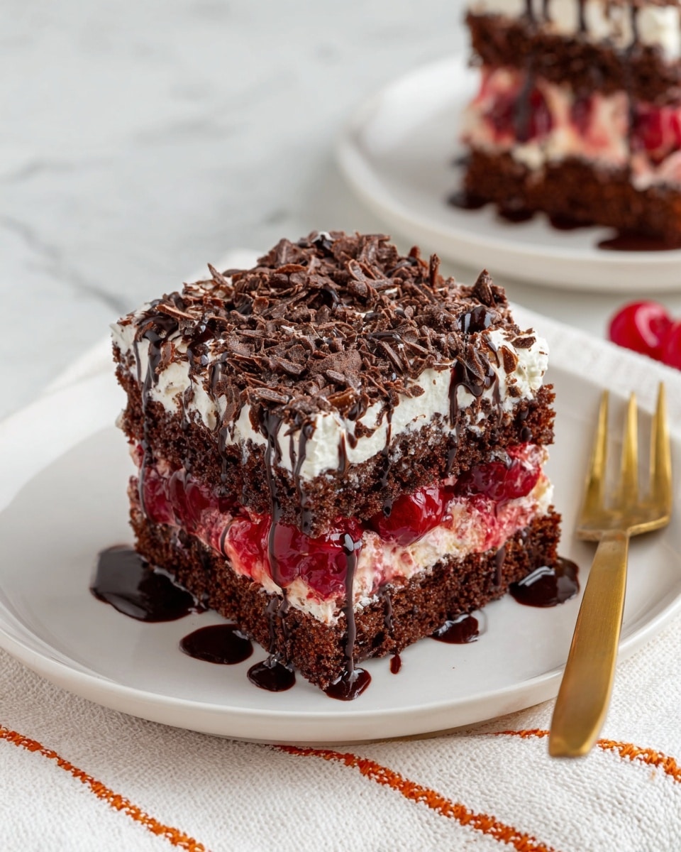 A square piece of chocolate cake sits on a white plate with dark chocolate drizzle. The cake has three main layers: the bottom is a rich dark brown chocolate sponge, in the middle is a thick layer of red cherry pieces mixed with chocolate filling, and the top is a creamy white layer covered with dark chocolate shavings. The sides show some cherry filling dripping down, and a gold fork rests beside the cake. The plate is on a white marbled surface with a white cloth with orange stitching nearby. Photo taken with an iphone --ar 4:5 --v 7