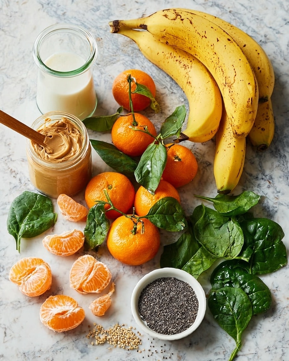 The image shows a collection of fresh fruits and ingredients arranged on a white marbled surface. There is a cluster of small, bright orange tangerines, some with green leaves still attached, and several tangerines peeled into segments in the middle. To the right, there are three yellow bananas with brown spots. Nearby, a white bowl contains small black and white chia seeds with a small wooden spoon resting inside. A glass jar of creamy peanut butter, with a wooden spreader on top coated in peanut butter, is placed on the left side. A clear glass jug filled with milk is also visible in the background. Fresh green spinach leaves add a touch of color and freshness around the ingredients. The overall layout is casual and natural, emphasizing the fresh, wholesome ingredients. photo taken with an iphone --ar 4:5 --v 7