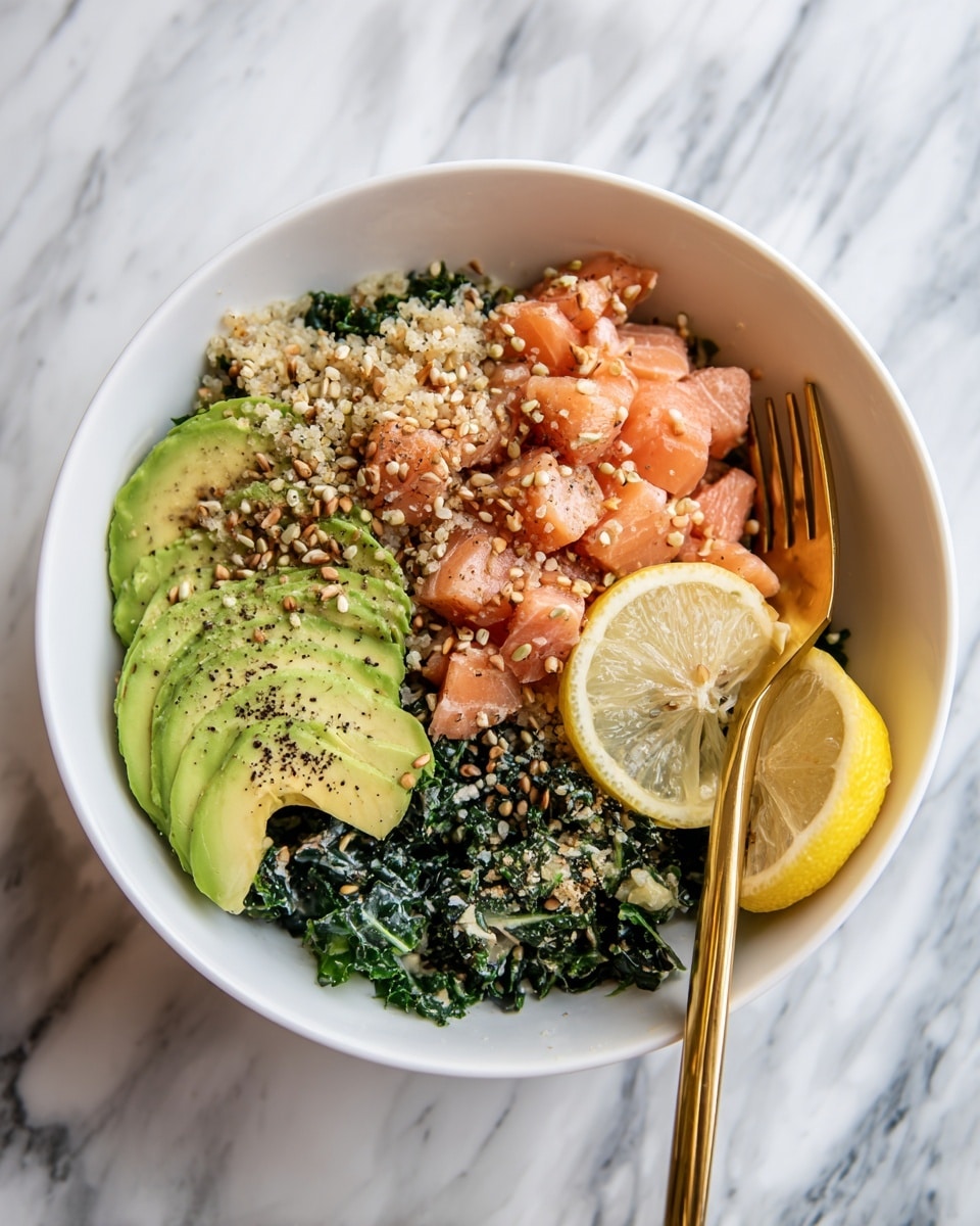 A white bowl filled with a dish that has four main layers: the bottom layer is chopped dark green kale leaves, the middle layer is light pink cooked salmon chunks, the next layer is thin green slices of avocado, topped with a sprinkling of light brown breadcrumbs and seeds. There are two lemon wedges on the side, one near the top right and one at the bottom left, with black pepper sprinkled on them. A gold fork lies inside the bowl on the right side. The bowl is placed on a white marbled surface. Photo taken with an iphone --ar 4:5 --v 7