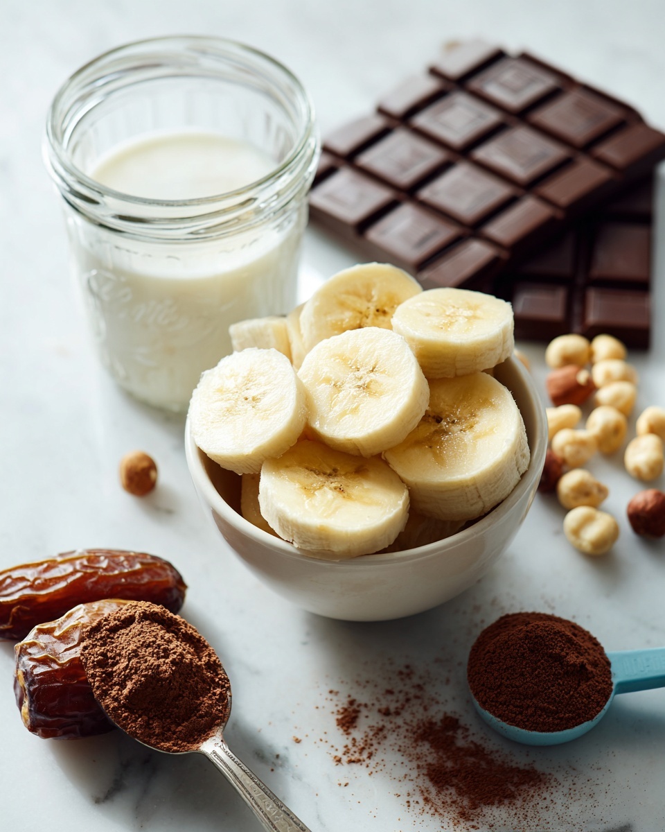 A white bowl filled with several thick slices of light yellow banana is placed in the front. Behind it, a clear glass jar is filled with white milk. To the right, there is a light blue measuring spoon filled with brown cocoa powder, placed on a white marbled surface. Next to the spoon, a few round, light tan hazelnuts are scattered. In the background, two dark brown dates and a chocolate bar with visible square sections are laid out. Photo taken with an iphone --ar 4:5 --v 7