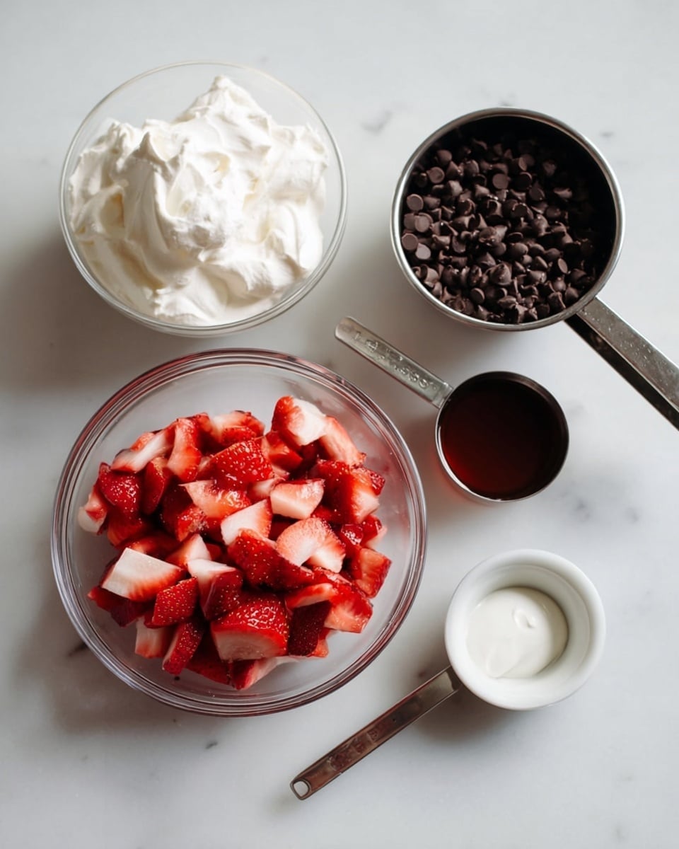 A clear glass bowl sits filled with roughly chopped bright red and white strawberries, with textures showing juicy and soft pieces. Nearby, a metal measuring cup holds plenty of small, smooth, dark chocolate chips, almost full to the top. Next to the chocolate is a metal measuring spoon containing a dark brown syrup that looks thick and shiny. Another small metal measuring spoon holds a little dark liquid placed beside the strawberry bowl. A small white bowl has a soft, white solid that appears smooth and slightly shiny. A metal measuring cup on the left side is overflowing with fluffy, white cream with a smooth, light texture. All these items sit on a white marbled surface, arranged neatly with clean space between them. photo taken with an iphone --ar 4:5 --v 7