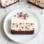 Peppermint Bark White Chocolate Mousse Cheesecake Recipe